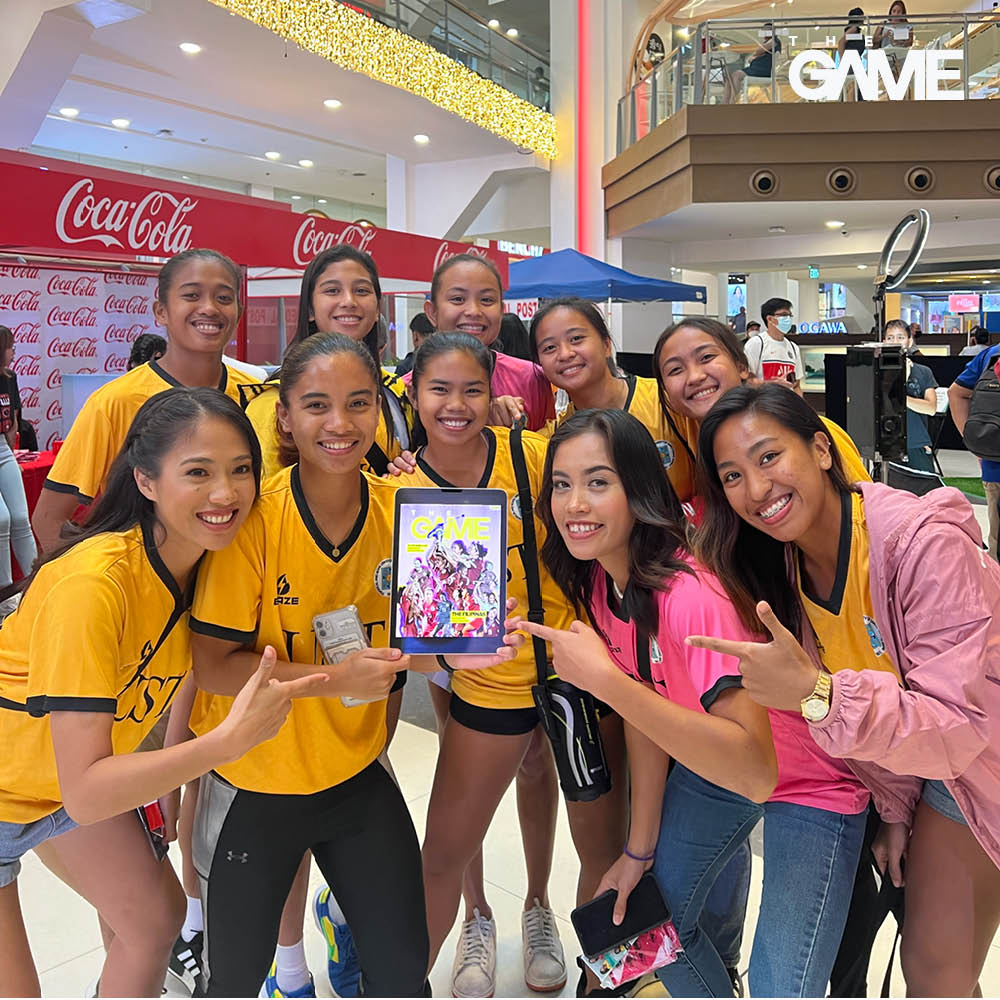 UST Women's Football Team players with The GAME's March cover featuring the Filipinas